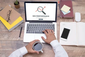 Man searching for SEO services on his laptop